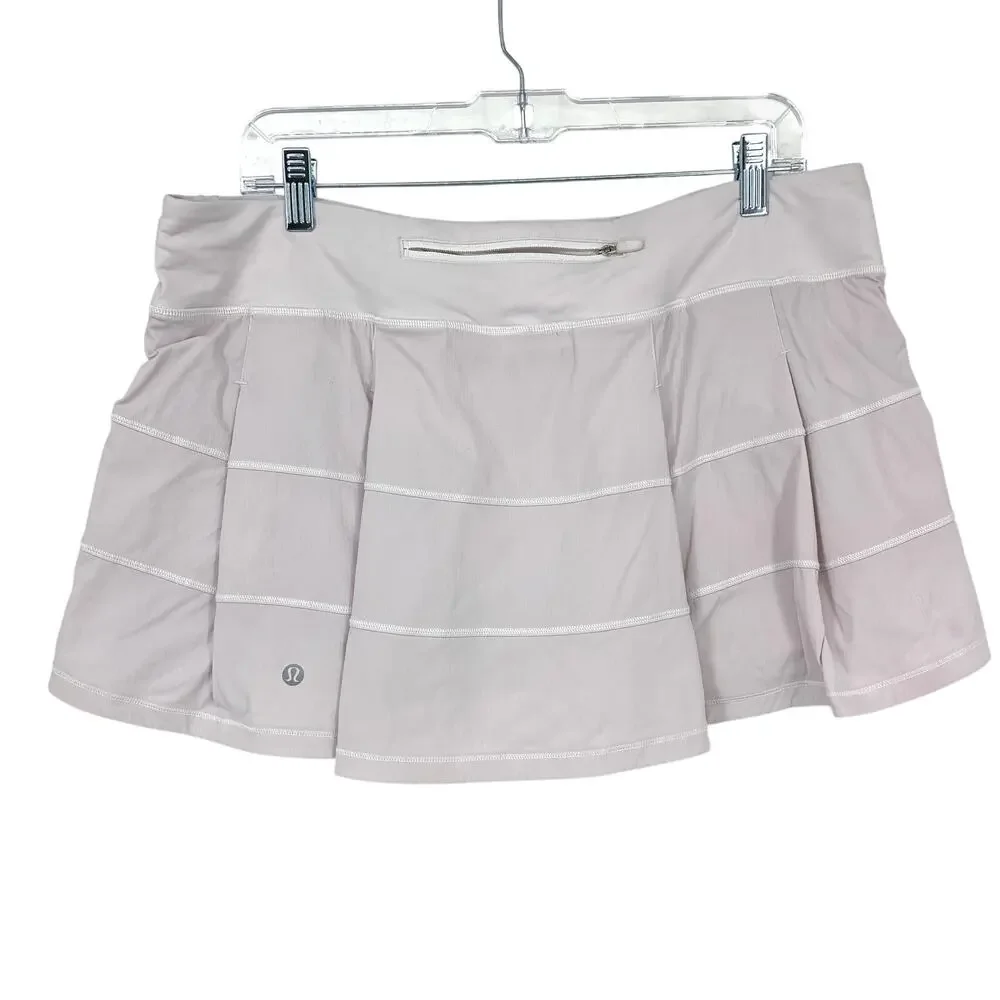 Lululemon Pace Rival Skirt 4 Way Stretch Womens Size 12 Light Pink *READ